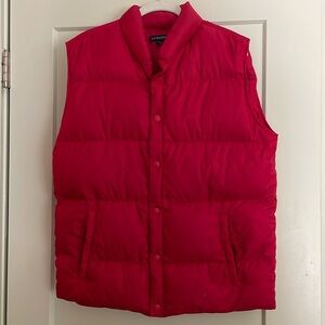 Women’s red down vest with snap closure and side pockets